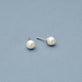 Stone and Strand Sterling Silver Essential Silver Pearl Studs Editorial Image