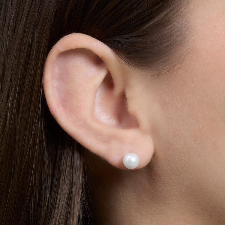 Image of Sterling Silver Essential Silver Pearl Studs on Models Ear
