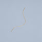 Stone and Strand 14K Yellow Gold Extra Long Gold Threader Earring Editorial Image
