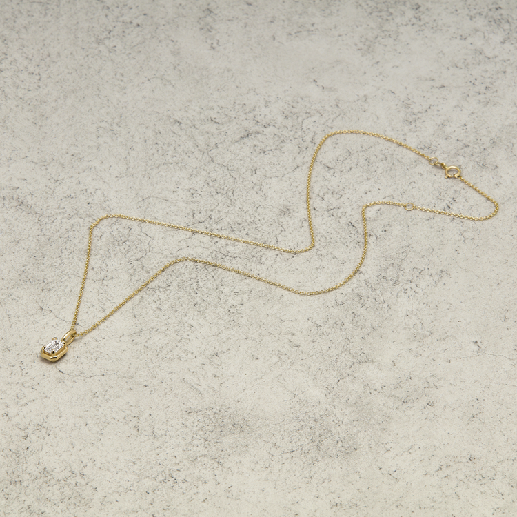 Stone and Strand 14K Yellow Gold Emerald Cut Birthstone Bonbon Necklace with White Topaz Editorial Image