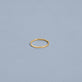 Stone and Strand 14K Yellow Gold Fine Flat Band Editorial Image