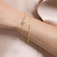 Image of 14K Yellow Gold Flat Arrow Chain Bracelet with Stone and Strand Bracelets