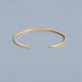 Stone and Strand 10K Yellow Gold Flat Cuff Bracelet Editorial Image