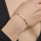 Image of 10K Yellow Gold Flat Cuff Bracelet on Models Arm