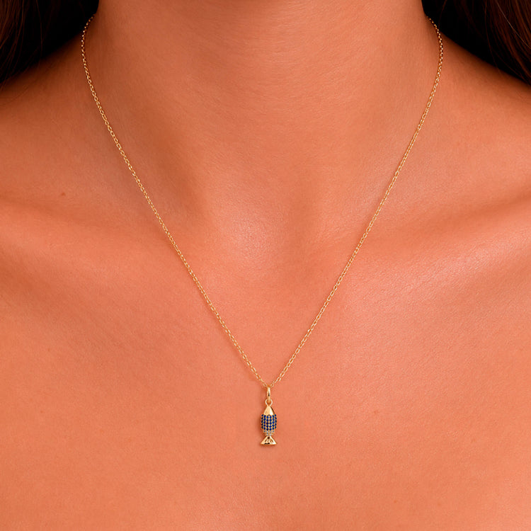Image of 10K Yellow Gold Fortune Fish Charm on Models Neck