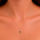 Image of 10K Yellow Gold Fortune Fish Charm on Models Neck