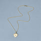 Stone and Strand 14K Yellow Gold Founding Member Diamond Crest Necklace Editorial Image
