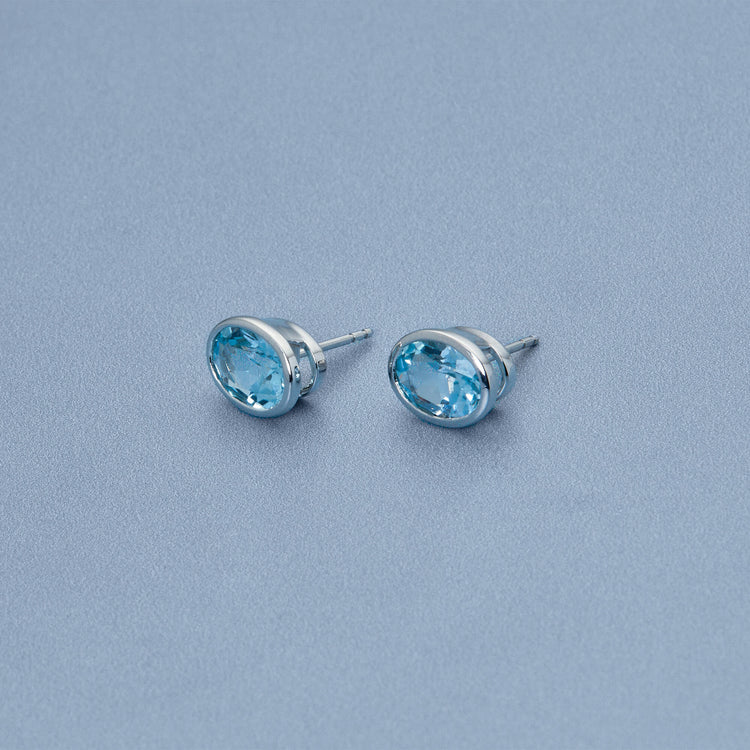 Stone and Strand 14K White Gold Full Volume Le Bleu Oval Stud Earrings Editorial Image