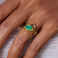 Image of 14K Yellow Gold Full Volume Marquise Emerald Luxe Ribbon Ring on Models Hand