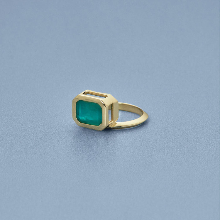 Stone and Strand 14K Yellow Gold Full Volume Offset Emerald Luxe Ring Editorial Image
