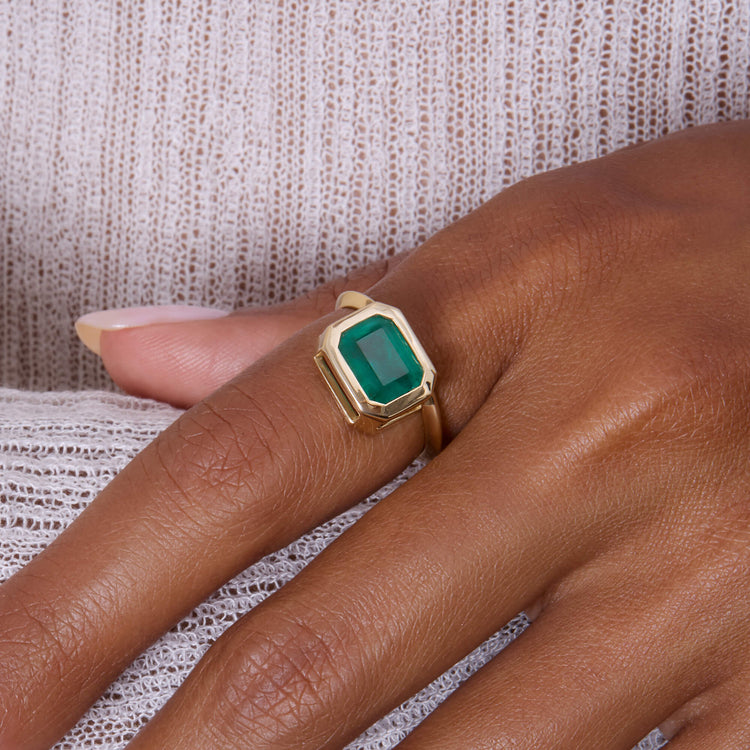 Image of 14K Yellow Gold Full Volume Offset Emerald Luxe Ring on Models Hand