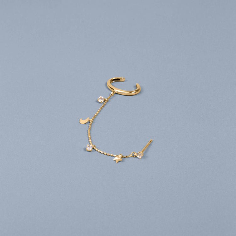 Stone and Strand 10K Yellow Gold Galaxy White Topaz Ear Cuff Editorial Image
