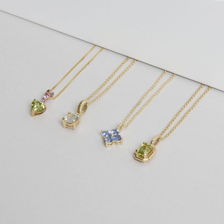 Still life image of Watermelon Candyland Necklace with Stone and Strand solid gold jewelry