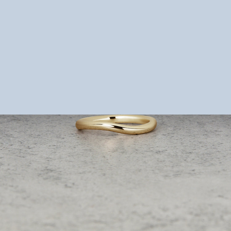 Stone and Strand 14K Yellow Gold Gentle Wave Band Editorial Image