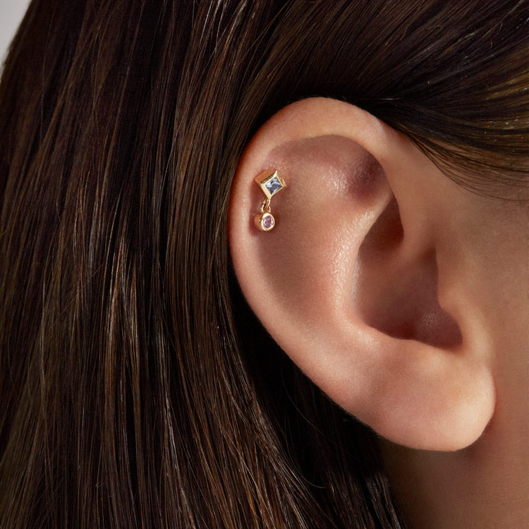 Image of 14K Yellow Gold Geranium Princess Push Pin Flat Back with Blue and Pink Sapphire on Models Ear