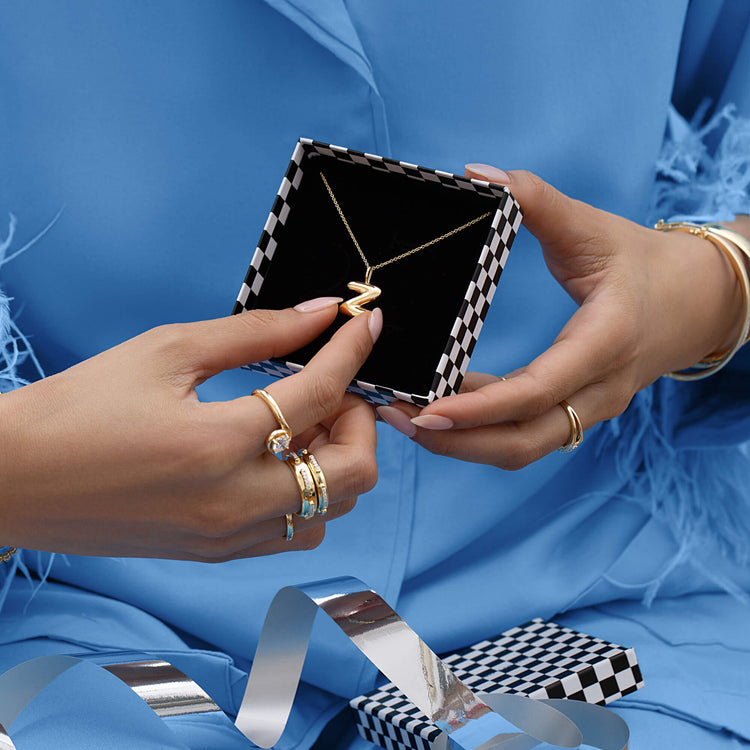 Model wearing Diamond Top Stitch Band with solid gold Stone and Strand jewelry