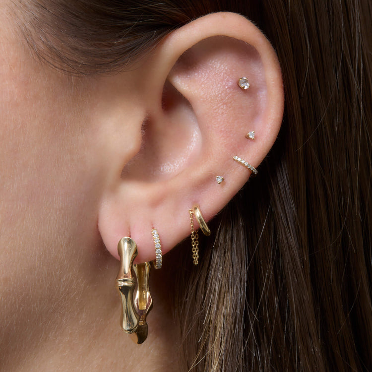 Image of 14K Yellow Gold Gold Bamboo Huggies with Stone and Strand Earrings