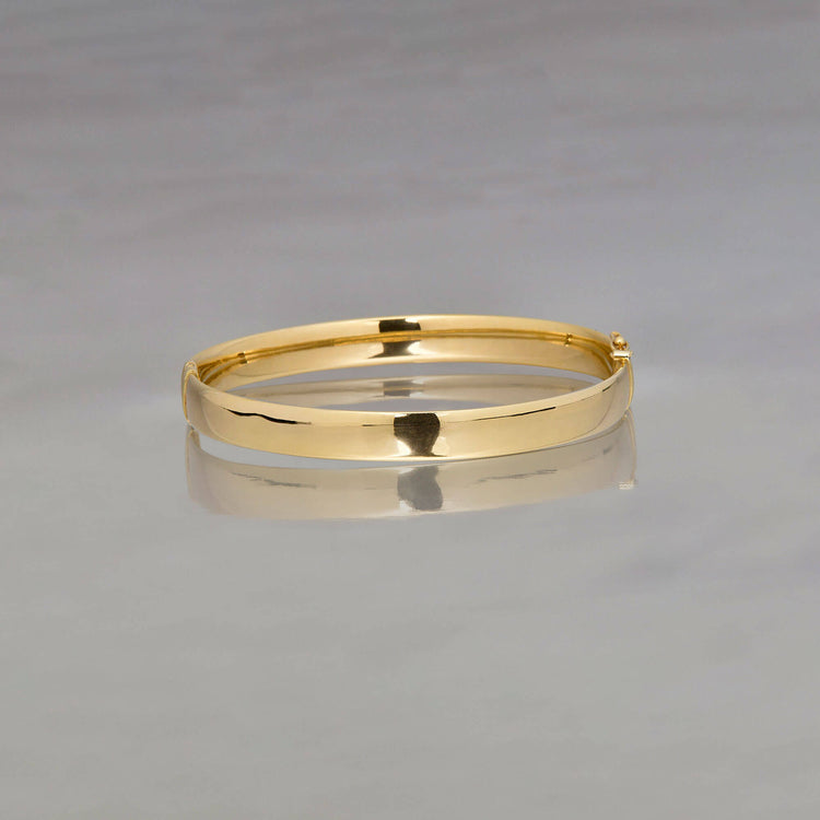 Stone and Strand 10K Yellow Gold Gold Cigar Bangle Editorial Image