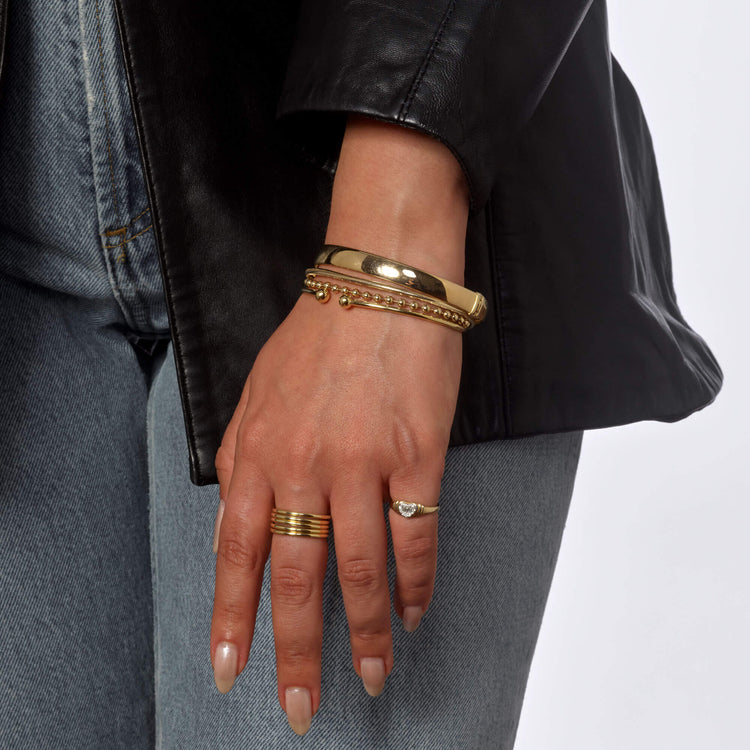 Image of 10K Yellow Gold Gold Cigar Bangle with Stone and Strand Bracelets