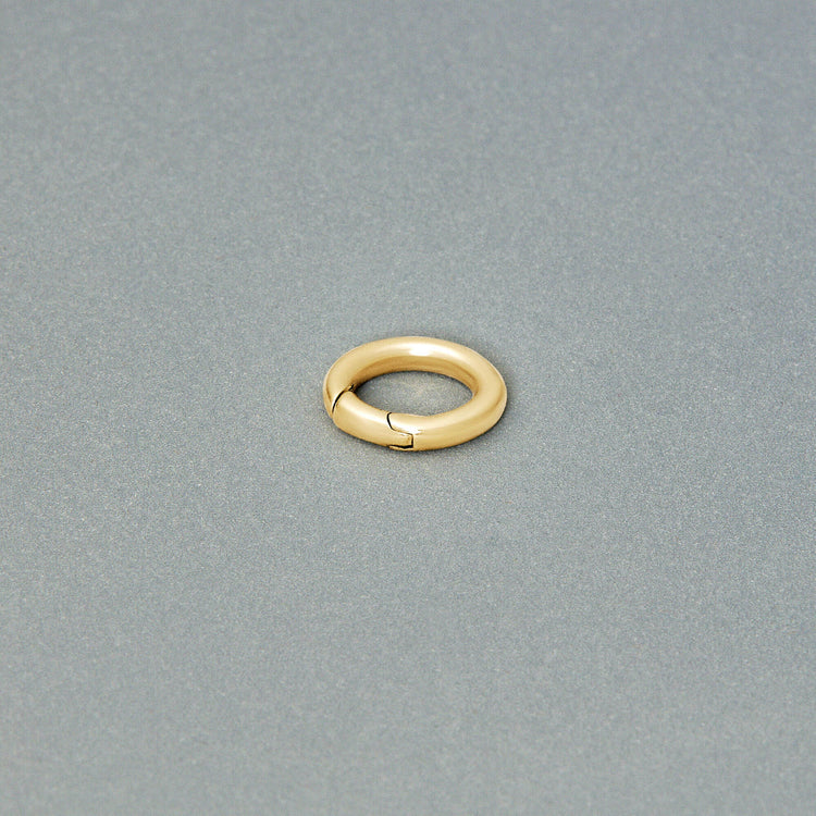 Stone and Strand 14K Yellow Gold Gold Circle Charm Connector Editorial Image