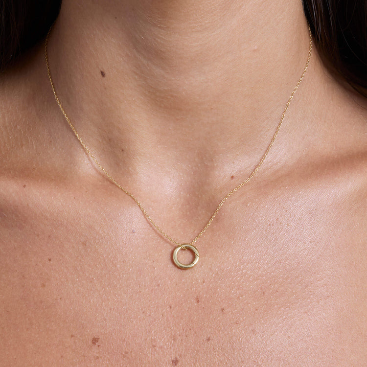 Image of 14K Yellow Gold Gold Circle Charm Connector on Models Neck