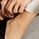 Image of 10K Yellow Gold Gold Cluster Anklet on Models Ankle