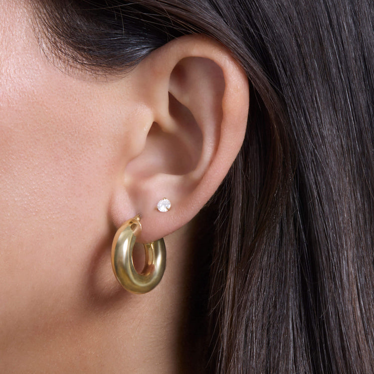 Image of 10K Yellow Gold Gold Doughnut Hoops on Models Ear