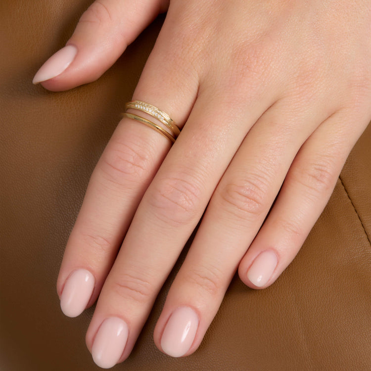 Image of 14K Yellow Gold Gold Knife Edge Stacking Set on Models Hand