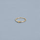 Stone and Strand 10K Yellow Gold Gold Knot Ring Editorial Image