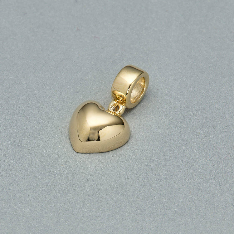 Stone and Strand 14K Yellow Gold Gold Puff Heart Bead Editorial Image
