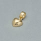 Stone and Strand 14K Yellow Gold Gold Puff Heart Bead Editorial Image