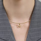 Image of 14K Yellow Gold Gold Puff Heart Bead on Models Neck