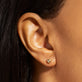 Image of 14K Yellow Gold Small Gold Puff Heart Stud Earrings on Models Ear