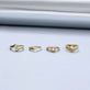 Still life image of The Tina Ring with Stone and Strand solid gold jewelry