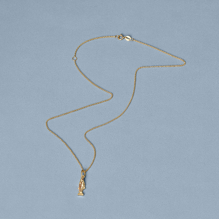 Stone and Strand 14K Yellow Gold Salmon Brunch Necklace Editorial Image