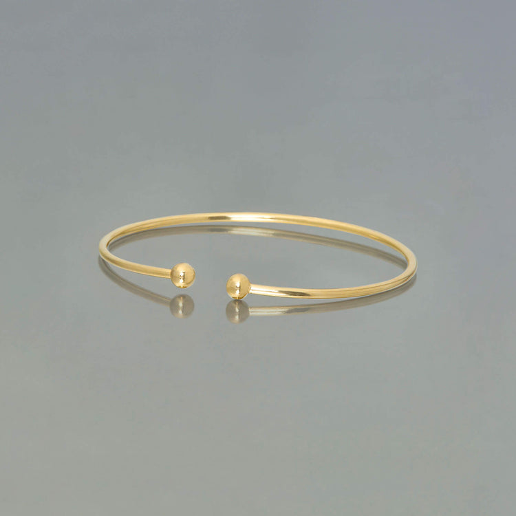 Stone and Strand 10K Yellow Gold Gold Stacker Cuff Editorial Image