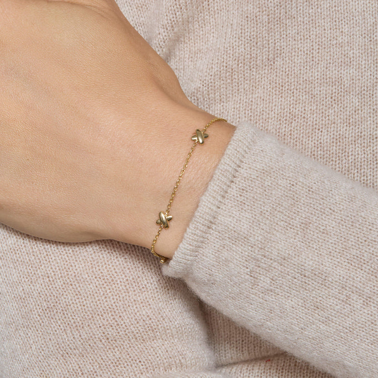 Image of 14K Yellow Gold Golden Kisses Bracelet on Models Arm
