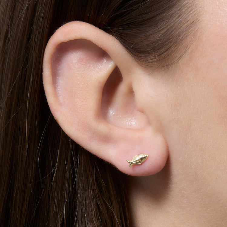 Image of 14K Yellow Gold Gone FIshing Studs on Models Ear