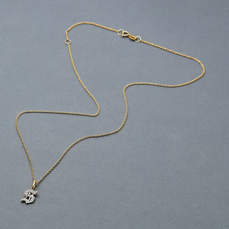 Stone and Strand 14K Yellow Gold Gothic Pave Initial Necklace Editorial Image