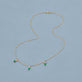 Stone and Strand 10K Yellow Gold Green Goddess Trio Emerald Necklace Editorial Image
