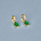 Stone and Strand 14K Yellow Gold Green Luxe Emerald Ridged Huggies Editorial Image