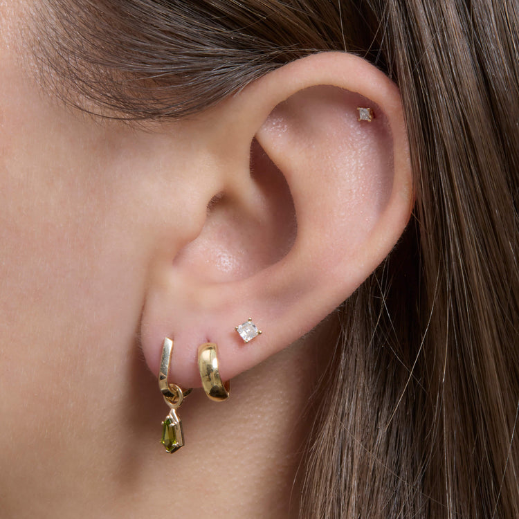 Image of 14K Yellow GoldGreen Tourmaline Knife Edge Shield Drop Huggies with Stone and Strand Earrings