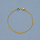 Stone and Strand 14K Yellow Gold Green Tourmaline Shield Bracelet Editorial Image