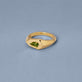 Stone and Strand 14K Yellow Gold Green Tourmaline Shield Pinky Ring Editorial Image