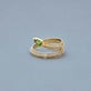 Stone and Strand 14K Yellow Gold Green Tourmaline Shield Serpent Ring Editorial Image