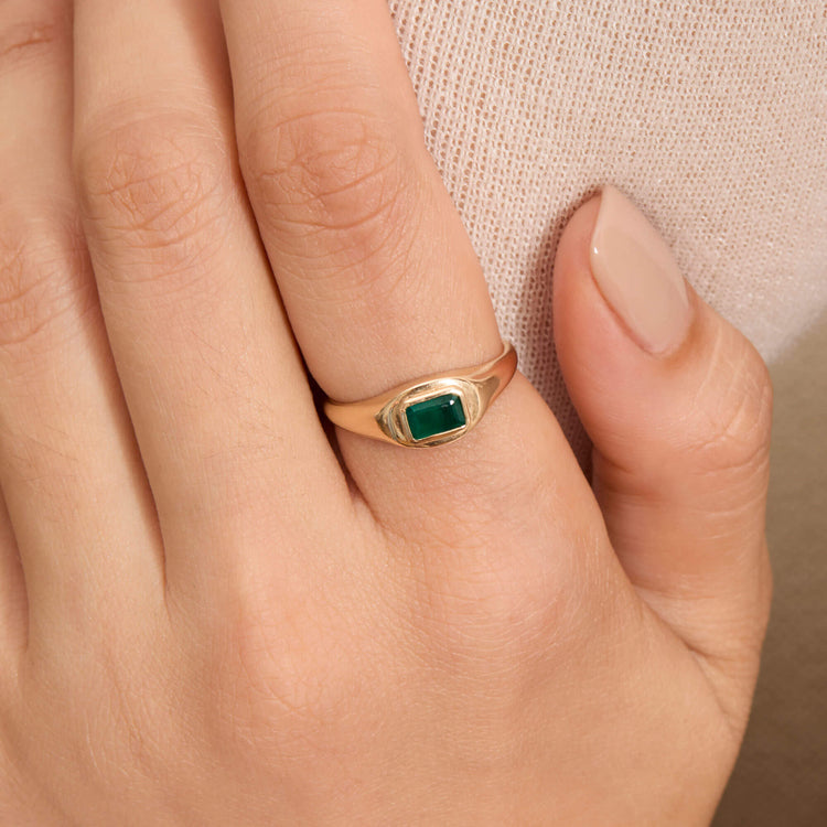 Image of 14K Yellow Gold Emerald Cut Birthstone Signet on Models Hand