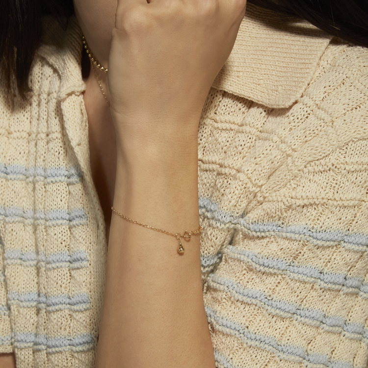 Image of 10K Yellow Gold Gold Drop Bracelet on Models Arm