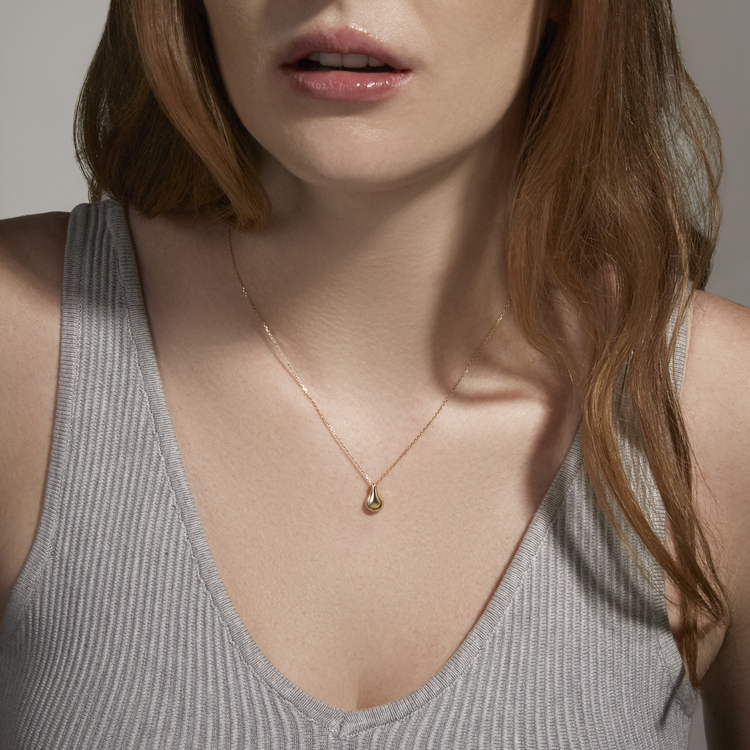 Image of 10K Yellow Gold Gold Drop Necklace on Models Neck