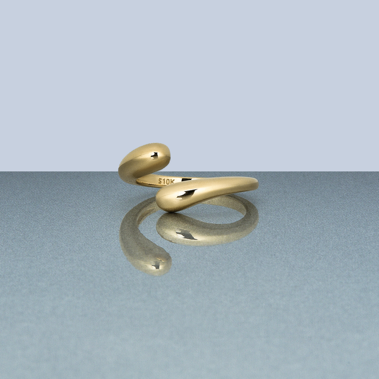Stone and Strand 10K Yellow Gold Golden Droplet Hug Ring Editorial Image