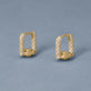 Stone and Strand 14K Yellow Gold Half-Starboard Diamond Earrings Editorial Image
